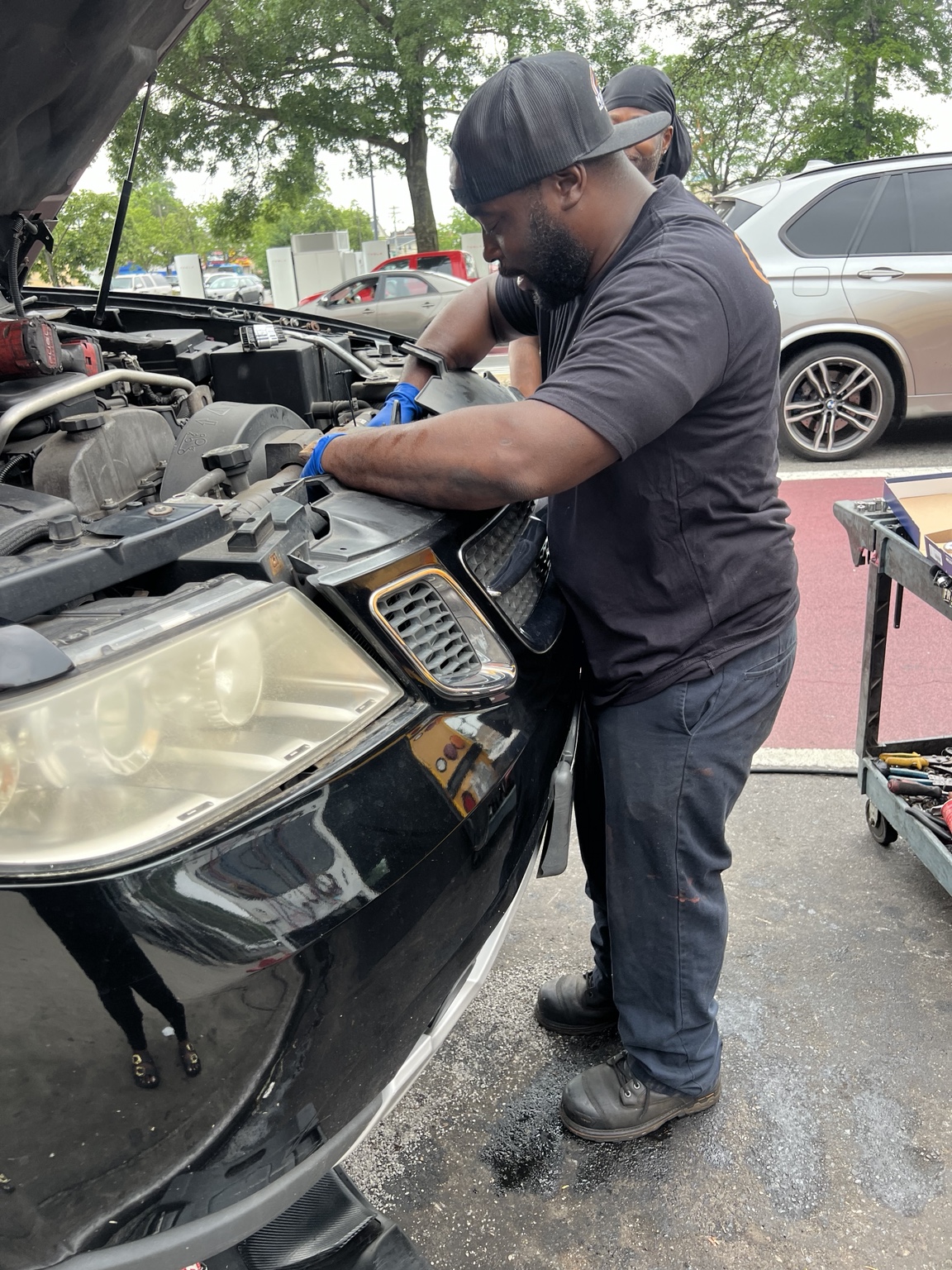 Magic Touch technician performing mobile auto repair